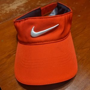 Red Nike golf visor